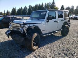 Salvage cars for sale from Copart Graham, WA: 2012 Jeep Wrangler Unlimited Sahara