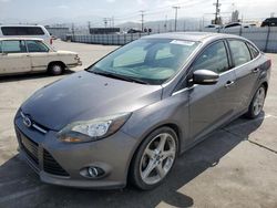 Salvage cars for sale from Copart Sun Valley, CA: 2012 Ford Focus Titanium
