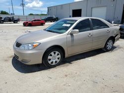 Salvage cars for sale from Copart Jacksonville, FL: 2004 Toyota Camry LE