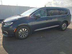 Salvage cars for sale at Miami, FL auction: 2022 Chrysler Pacifica Hybrid Touring L