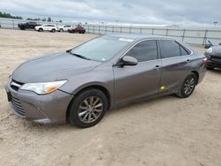Flood-damaged cars for sale at auction: 2015 Toyota Camry LE