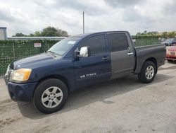 Salvage cars for sale at Orlando, FL auction: 2009 Nissan Titan XE