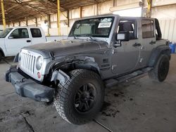 Salvage cars for sale from Copart Phoenix, AZ: 2013 Jeep Wrangler Unlimited Sport