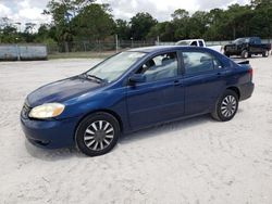 Salvage cars for sale from Copart Fort Pierce, FL: 2003 Toyota Corolla CE