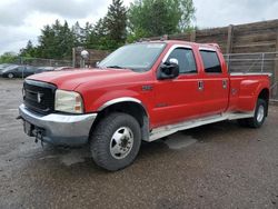 Salvage trucks for sale at Blaine, MN auction: 2002 Ford F350 Super Duty