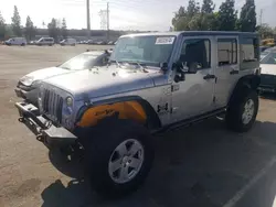 Salvage cars for sale at Rancho Cucamonga, CA auction: 2013 Jeep Wrangler Unlimited Sport