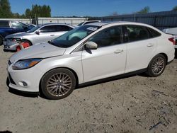 Salvage cars for sale from Copart Arlington, WA: 2012 Ford Focus SEL