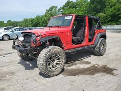 Salvage cars for sale from Copart Ellwood City, PA: 2015 Jeep Wrangler Unlimited Sport