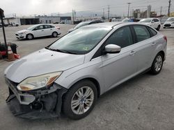 Salvage cars for sale from Copart Sun Valley, CA: 2012 Ford Focus SEL