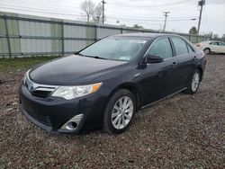 Salvage cars for sale from Copart Central Square, NY: 2014 Toyota Camry Hybrid