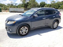 Salvage cars for sale from Copart Fort Pierce, FL: 2015 Nissan Rogue S