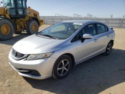 Salvage cars for sale from Copart Adelanto, CA: 2015 Honda Civic SE