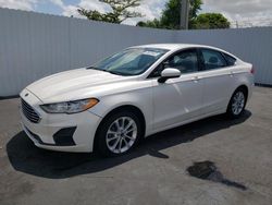 Salvage cars for sale from Copart Miami, FL: 2020 Ford Fusion SE