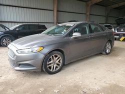 Salvage cars for sale at Houston, TX auction: 2013 Ford Fusion SE