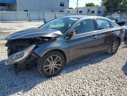 Salvage cars for sale at auction: 2013 Toyota Avalon Base