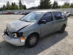 Salvage cars for sale from Copart Graham, WA: 1999 Toyota Sienna CE