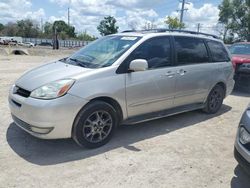 Toyota Sienna xle salvage cars for sale: 2004 Toyota Sienna XLE