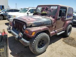 Salvage cars for sale from Copart Tucson, AZ: 2001 Jeep Wrangler / TJ Sahara