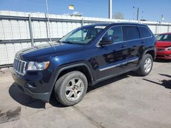 SUV salvage a la venta en subasta: 2011 Jeep Grand Cherokee Laredo