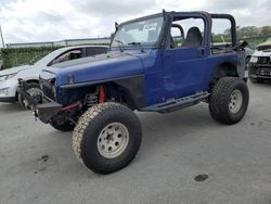 Vehiculos salvage en venta de Copart Orlando, FL: 1999 Jeep Wrangler / TJ Sport