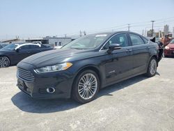 Salvage cars for sale at Sun Valley, CA auction: 2014 Ford Fusion SE Hybrid