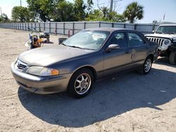 Salvage cars for sale from Copart Riverview, FL: 2000 Mazda 626 ES