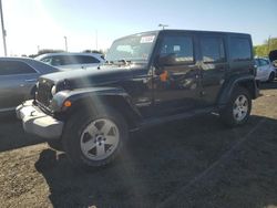Salvage cars for sale at East Granby, CT auction: 2011 Jeep Wrangler Unlimited Sahara