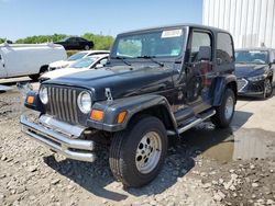 Jeep salvage cars for sale: 1999 Jeep Wrangler / TJ Sahara