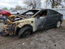 Salvage cars for sale at London, ON auction: 2019 Ford Fusion Titanium
