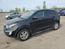 Salvage cars for sale from Copart Montreal Est, QC: 2013 KIA Sportage Base