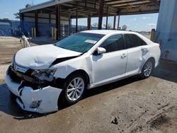Salvage cars for sale from Copart Riverview, FL: 2013 Toyota Camry Hybrid