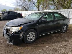 Salvage cars for sale from Copart London, ON: 2014 Toyota Camry Hybrid