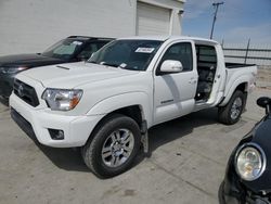 Salvage cars for sale from Copart Farr West, UT: 2012 Toyota Tacoma Double Cab