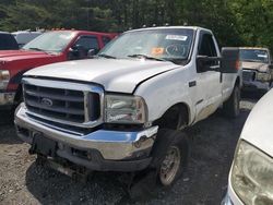 Salvage trucks for sale at Waldorf, MD auction: 2002 Ford F350 SRW Super Duty
