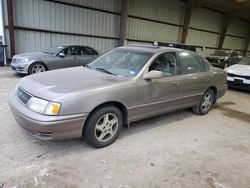 Salvage cars for sale from Copart Houston, TX: 1998 Toyota Avalon XL