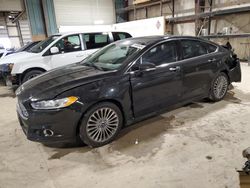 Salvage cars for sale at Eldridge, IA auction: 2014 Ford Fusion Titanium