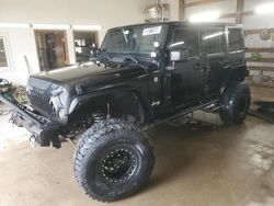 Salvage cars for sale at Pekin, IL auction: 2015 Jeep Wrangler Unlimited Sahara