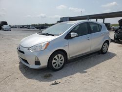 Salvage cars for sale at West Palm Beach, FL auction: 2014 Toyota Prius C