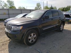 Salvage cars for sale from Copart Lansing, MI: 2011 Jeep Grand Cherokee Laredo
