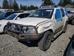 Salvage cars for sale from Copart Graham, WA: 2015 Nissan Xterra X