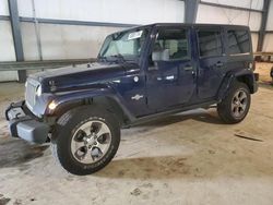 Salvage cars for sale from Copart Graham, WA: 2013 Jeep Wrangler Unlimited Sport