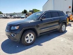 Vehiculos salvage en venta de Copart Orlando, FL: 2015 Jeep Grand Cherokee Laredo