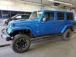 Salvage cars for sale at Pasco, WA auction: 2014 Jeep Wrangler Unlimited Sahara