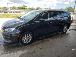 Salvage cars for sale from Copart Orlando, FL: 2023 Chrysler Voyager LX