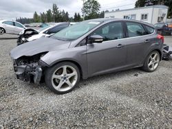 Salvage cars for sale from Copart Graham, WA: 2014 Ford Focus Titanium