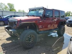Salvage cars for sale at Lansing, MI auction: 2010 Jeep Wrangler Unlimited Sahara