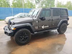 Salvage cars for sale from Copart Atlantic Canada Auction, NB: 2021 Jeep Wrangler Unlimited Sport