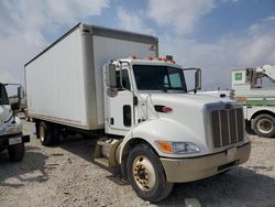 Salvage cars for sale from Copart Haslet, TX: 2009 Peterbilt 335