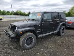 Salvage cars for sale at Windsor, NJ auction: 2011 Jeep Wrangler Unlimited Sahara