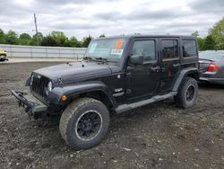 Jeep Wrangler Unlimited Sahara salvage cars for sale: 2011 Jeep Wrangler Unlimited Sahara